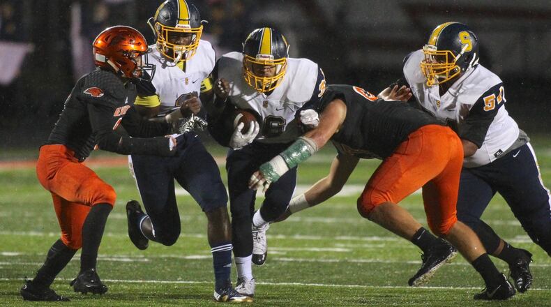 Springfields Delian Bradley runs against Beavercreek on Friday, Oct. 12, 2018, at Beavercreek. David Jablonski/Staff
