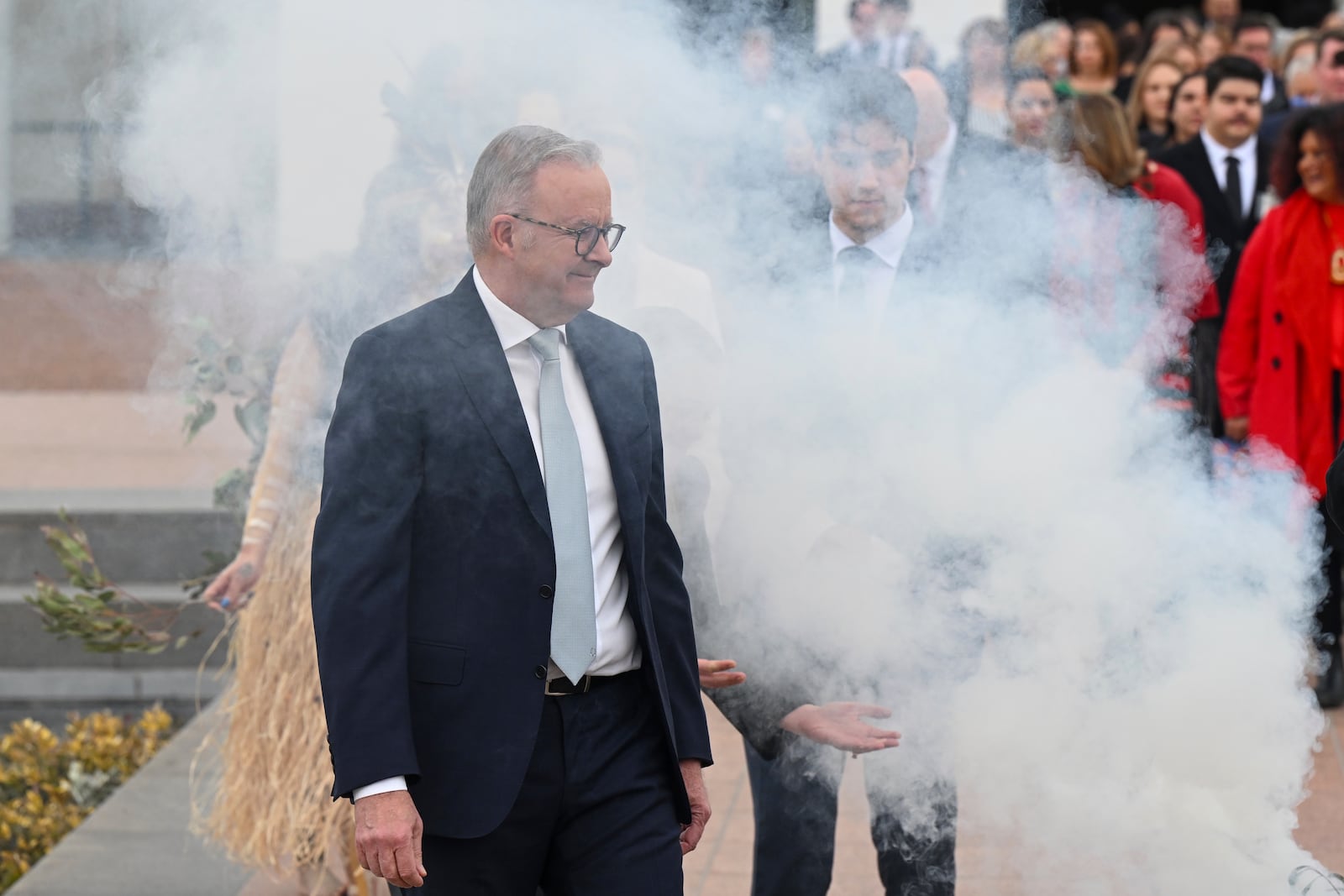 Australian Prime Minister Anthony Albanese attends a smoking ceremony ahead of opening of the 48th Federal Parliament on the forecourt of Parliament House in Canberra, Tuesday, July 22, 2025. (Lukas Coch/AAPImage via AP)