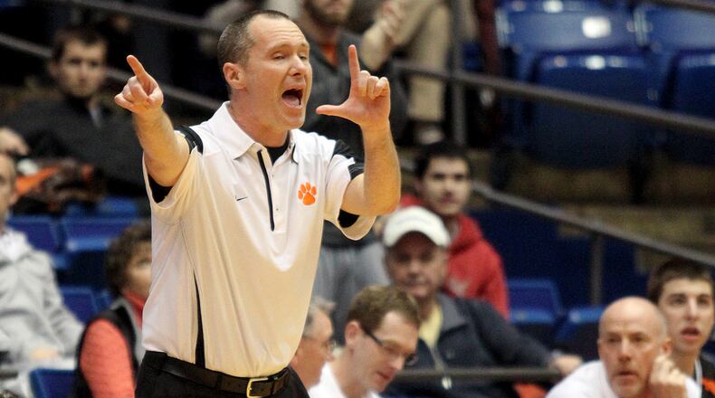 West Liberty-Salem head coach Aaron Hollar signals a play against Summit Country Day during their Div. III district final at UD Arena in Dayton Thursday, Mar. 7, 2013. CONTRIBUTED PHOTO BY E.L. HUBBARD