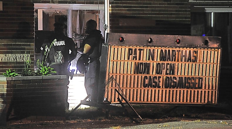A standoff with a man who went into Pat & Martha’s Tavern on Aug. 27 with a gun and threatened the owner ended after more than five hours. MARSHALL GORBY/STAFF