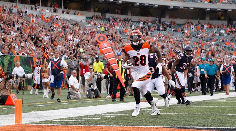 CINCINNATI, OH - AUGUST 09: Joe Mixon #28 of the Cincinnati Bengals runs into the end zone for a 24-yard touchdown reception in the first quarter of a preseason game against the Chicago Bears at Paul Brown Stadium on August 9, 2018 in Cincinnati, Ohio. (Photo by Joe Robbins/Getty Images)
