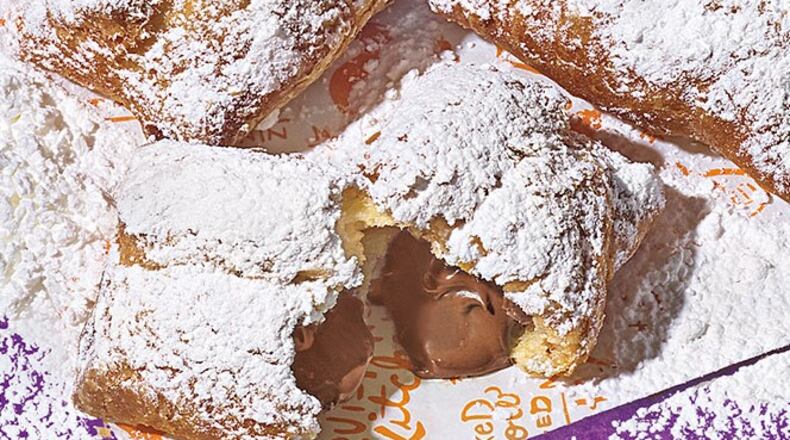 Popeyes chicken restaurants in southwest Ohio are now offering chocolate-filled beignets after the New Orleans-style dessert performed very well during its test-market phase. CONTRIBUTED