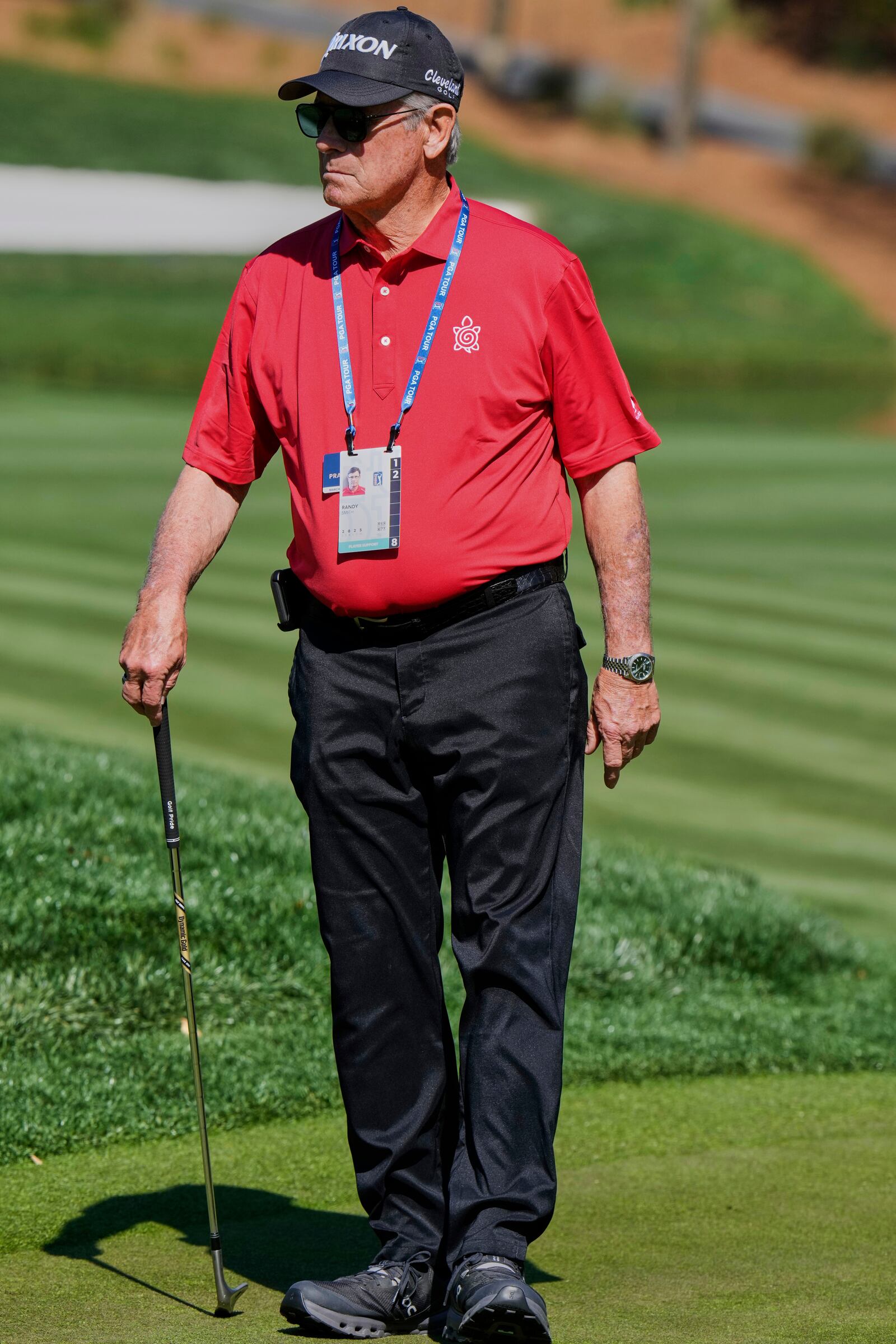 Randy Smith watches Scottie Scheffler during a practice round at The Players Championship golf tournament Wednesday, March 12, 2025, in Ponte Vedra Beach, Fla. (AP Photo/Chris O'Meara)