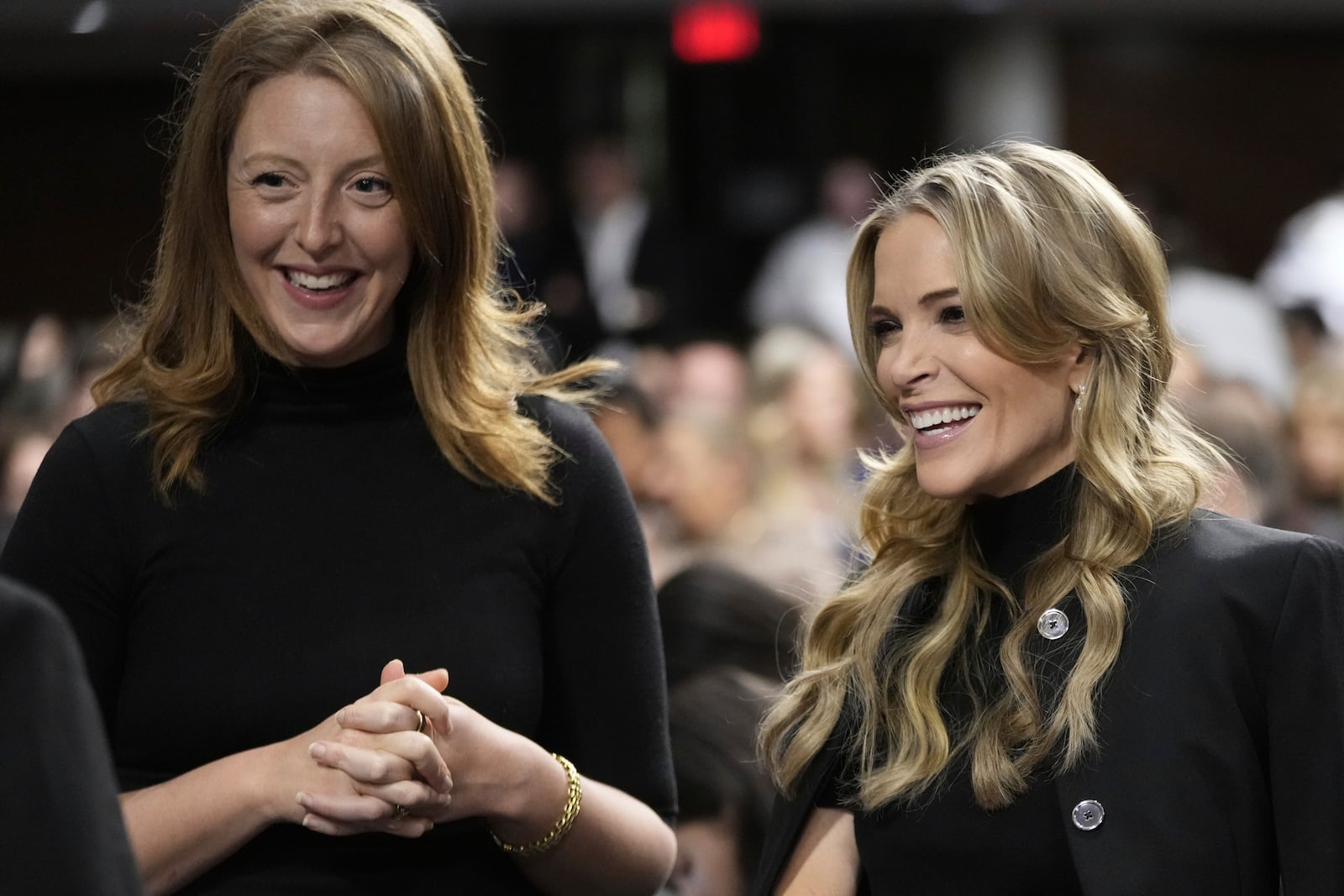 FILE - Dr. Casey Means, a wellness influencer, left, and journalist Megan Kelly, attend a confirmation hearing for Robert F. Kennedy Jr. for the Secretary of Health and Human Services post, at the Capitol in Washington, Jan. 29, 2025. (AP Photo/Ben Curtis, File)