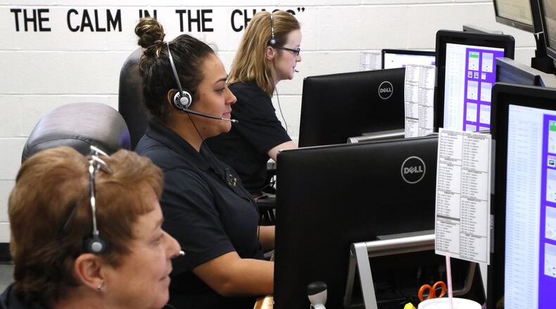 Dispatchers in the Clark County Dispatch Center. Bill Lackey/Staff