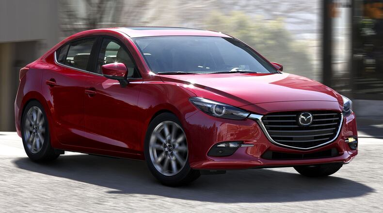 The 2018 Mazda3 receives newly standard features in all trim levels, including automatic emergency braking. Available as a sedan or a hatchback, this compact car carries a starting MSRP of $18,095. Mazda photo