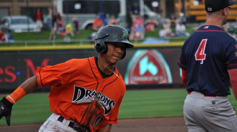 Dragons left fielder Miles Gordon rounds third and scores following a single from DH Michael Beltre during the first inning of Dayton’s game against the Peoria Chiefs at Fifth Third Field on Friday, May 11, 2018. Nick Dudukovich/CONTRIBUTED