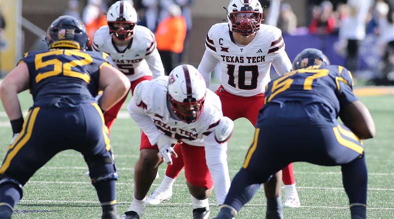 Texas Tech linebacker Jacob Rodriguez (10) lines up against West Virginia during the second half of an NCAA college football game Saturday, Nov. 29, 2025, in Morgantown, W.Va. (AP Photo/Kathleen Batten)