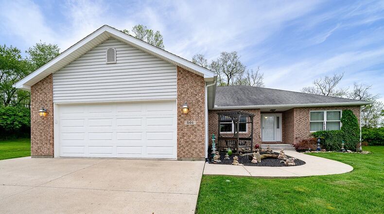 This 4-bedroom home with about 2,120 sq. ft. of living space features an open concept floor plan. CONTRIBUTED PHOTO