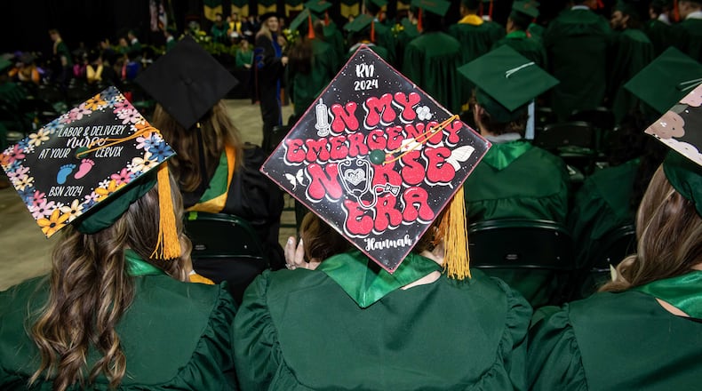 Wright State University students graduate in a December ceremony. Recent Ohio legislation introducted would block universities from offering diversity, equity and inclusion (DEI) initiatives, prohibit full-time university faculty from striking, and require universities to “affirm and declare that the state institution will not encourage, discourage, require or forbid students, faculty, or administrators to endorse, assent to, or publicly express a given ideology, political stance, or view of a social policy, nor will the institution require students to do any of those things to obtain an undergraduate or post-graduate degree.” ERIN PENCE/WRIGHT STATE UNIVERSITY