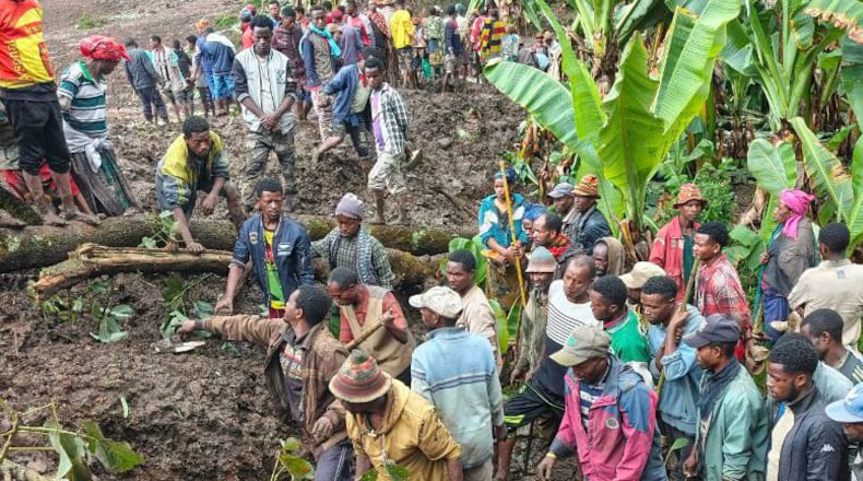 Locals search for the bodies of mudslide victims in the Gacho Baba district of the Gamo Zone in southern Ethiopia on Tuesday, March 10, 2026. (Gacho Baba District Government Communication Affairs Department via AP)