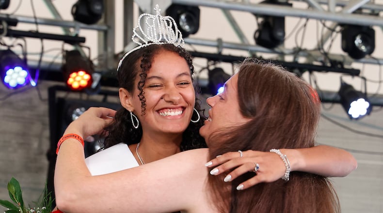 Chloe Gillaugh, the 2023 Clark County Fair Queen, gets a hug from her mother, Michelle, after being crowned Friday, July 21, 2023. BILL LACKEY/STAFF