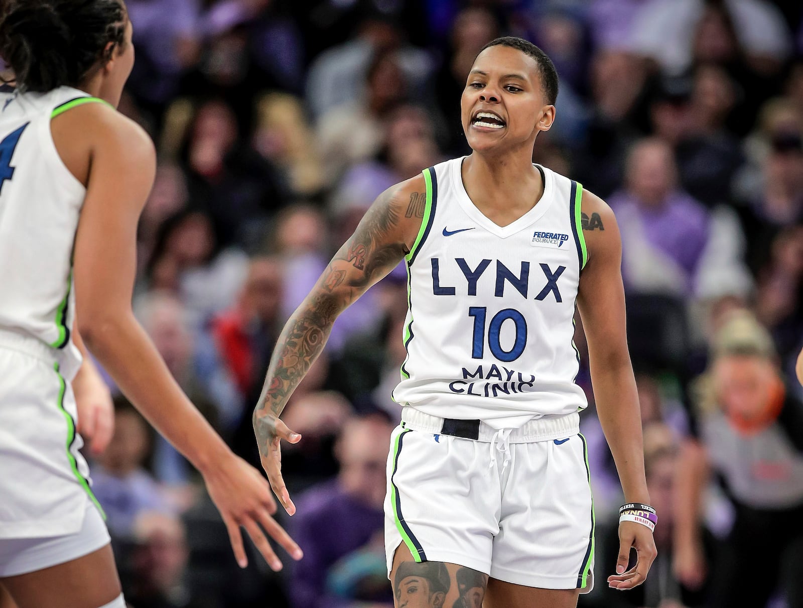 Courtney Williams (10) celebrates a 3-point shot in the second half as the Golden State Valkyries played the Minnesota Lynx at Chase Center in San Francisco, on Sunday, June 1, 2025. (Carlos Avila Gonzalez/San Francisco Chronicle via AP)