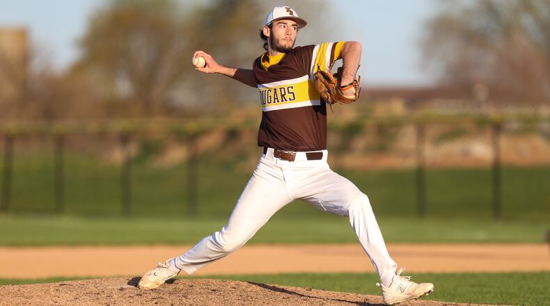 Cutline: Kenton Ridge High School senior Kegin Dotson motions to the plate during their game against London on Tuesday afternoon at Tom Randall Field in Springfield. The Cougars won 7-0. CONTRIBUTED PHOTO BY MICHAEL COOPER