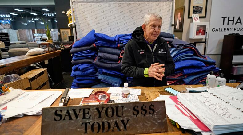 FILE - In this Feb. 17, 2021, file photo, owner Jim McIngvale talks about opening his Gallery Furniture store as a shelter in Houston. (AP Photo/David J. Phillip, File)