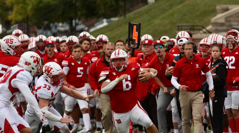 Wittenberg's Garrett Gross runs against Wabash on Saturday, Oct. 1, 2022, at Edwards-Maurer Field in Springfield. David Jablonski/Staff
