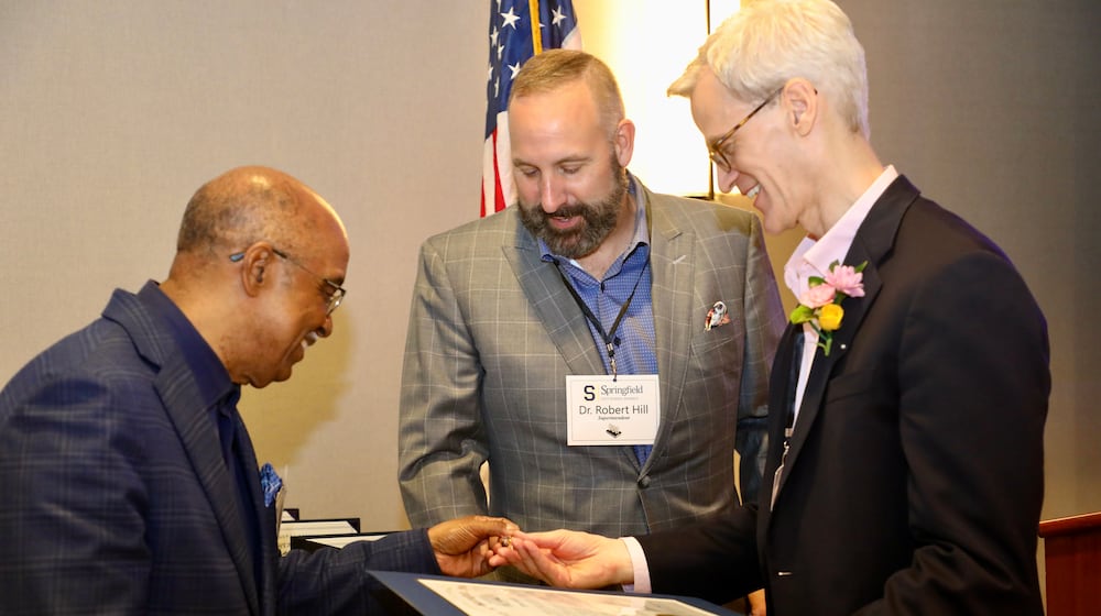 James Bacon (left) and Springfield City School Superintendent Bob Hill (middle) with former Alumni of Distinction award recipient Andrew Cutler (right). The 21s annual program will be held at 5:30 p.m. Friday, April 24, at the Courtyard by Marriott — Downtown Springfield, 100 S. Fountain Ave. SPRINGFIELD CITY SCHOOLS / CONTRIBUTED