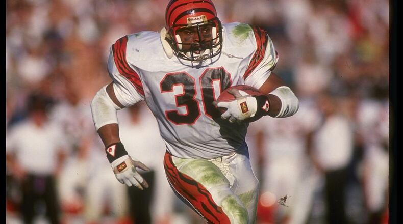 13 Jan 1991: Running back Ickey Woods of the Cincinnati Bengals runs with the ball during a playoff game against the Los Angeles Raiders at the Coliseum in Los Angeles, California. The Raiders won the game, 20-10.