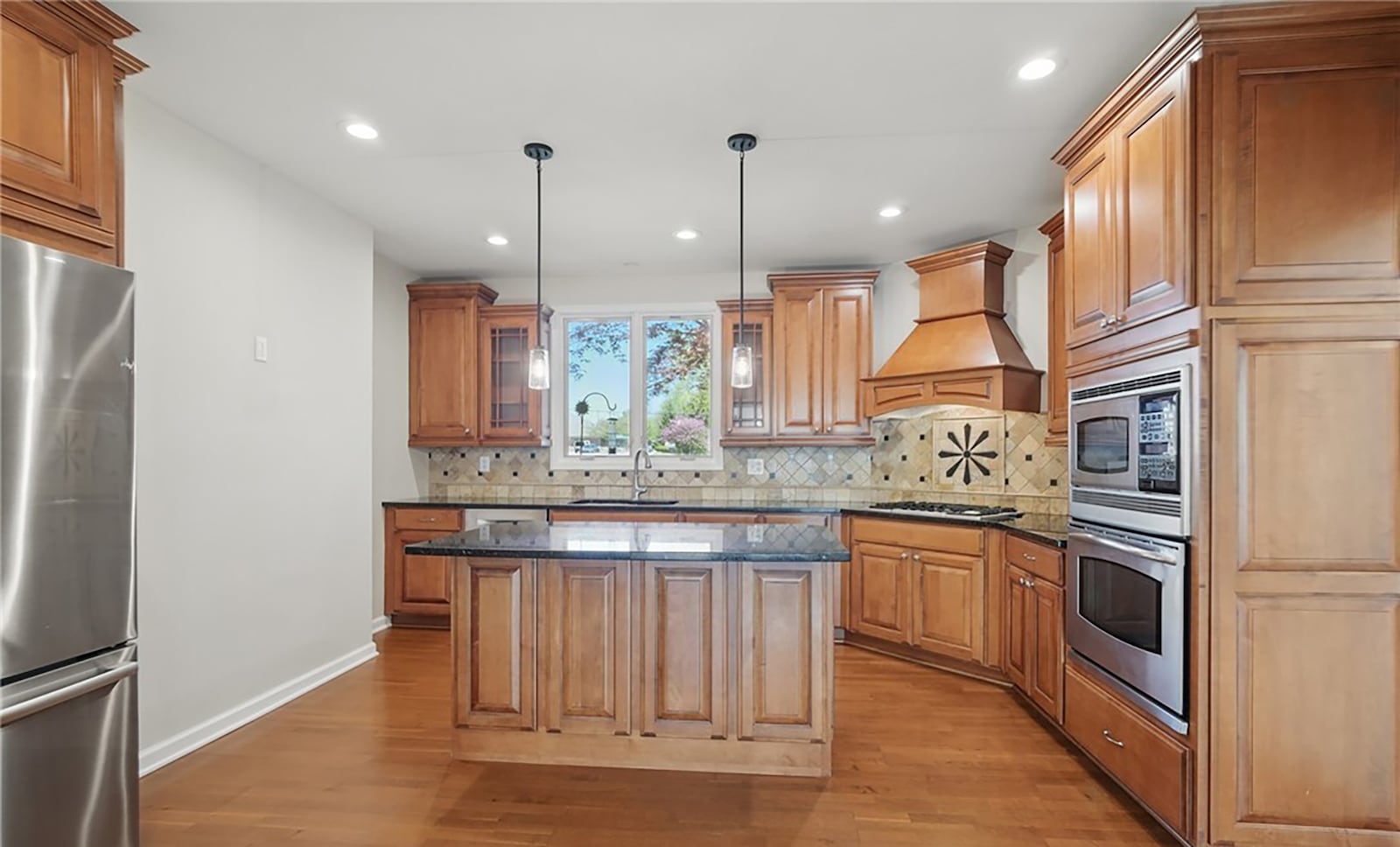 The kitchen has been totally remodeled with all new upscale appliances. It has hardwood flooring and wood cabinets. CONTRIBUTED