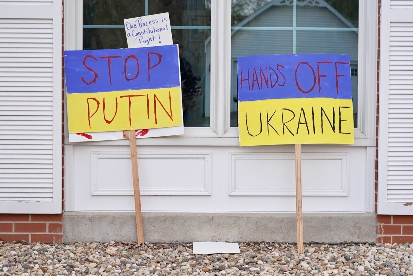 Signs with messages of support for Ukraine outside a contentious town hall event hosted by Sen. Chuck Grassley in Northwood, Iowa on Wednesday, April 23, 2025. (AP photo/Mark Vancleave)
