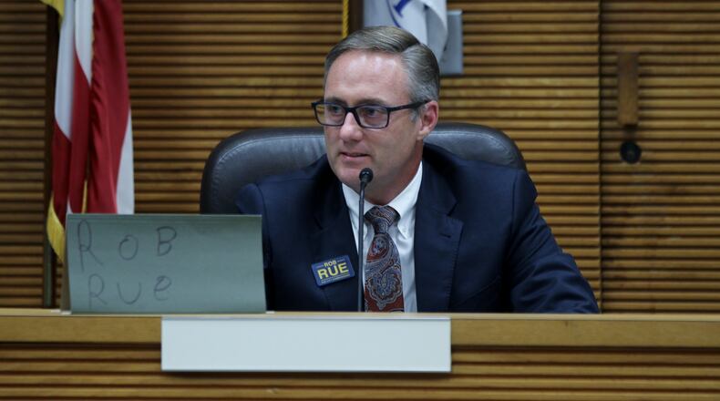 Rob Rue speaks at the CONA candidates night at the City Hall forum last month. MICHAEL COOPER/STAFF