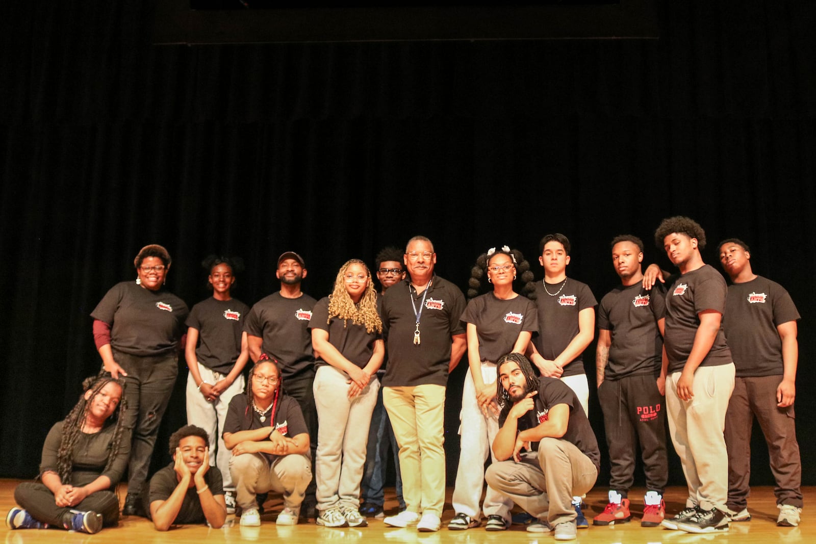This image released by Carnegie Mellon University shows Gary Edwin Robinson, recipient of the 2025 Excellence in Theatre Education Award, center, with his students at the Boys and Girls High School in the Brooklyn borough of New York on May 7, 2025. (Pam Wigley/Carnegie Mellon University via AP)