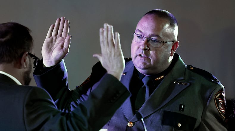Christopher Clark is sworn in as the new Clark County Sheriff Thursday, Jan. 2, 2025 in front of a packed house at the State Theater in downtown Springfield. BILL LACKEY/STAFF