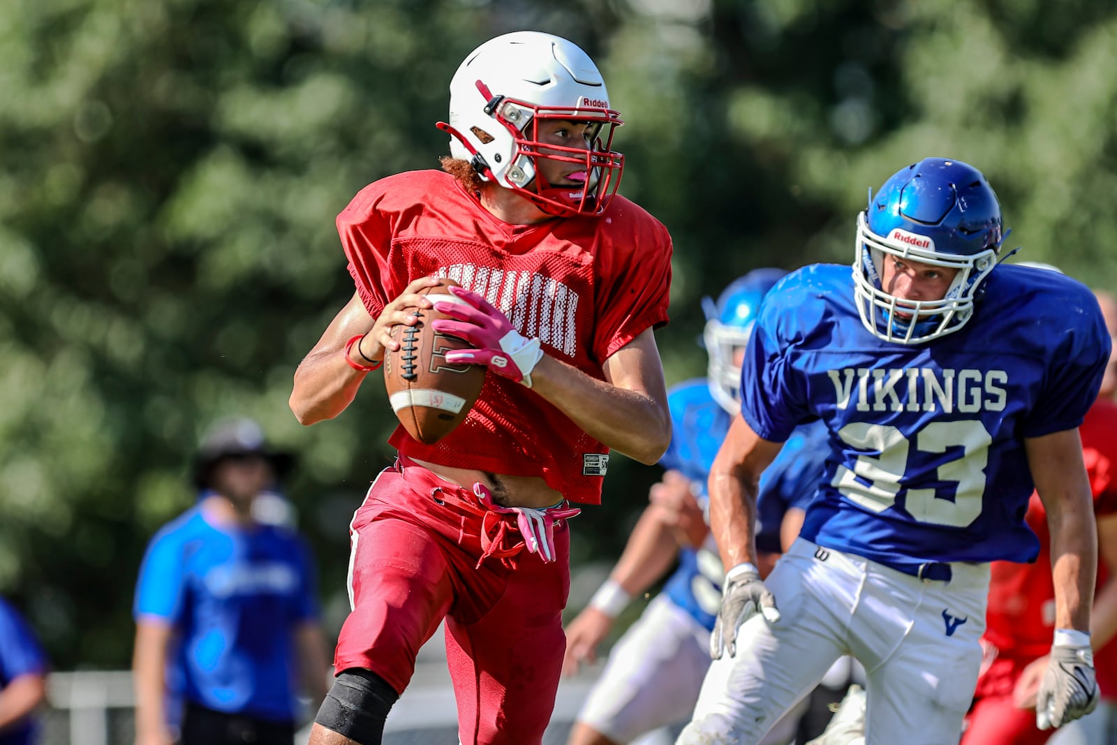 Several football scrimmages took place in Clark County on Saturday, including Miami East at Southeastern; Ponitz, Minster and Urbana at Shawnee; and Louisville Trinity at Springfield. MICHAEL COOPER / STAFF