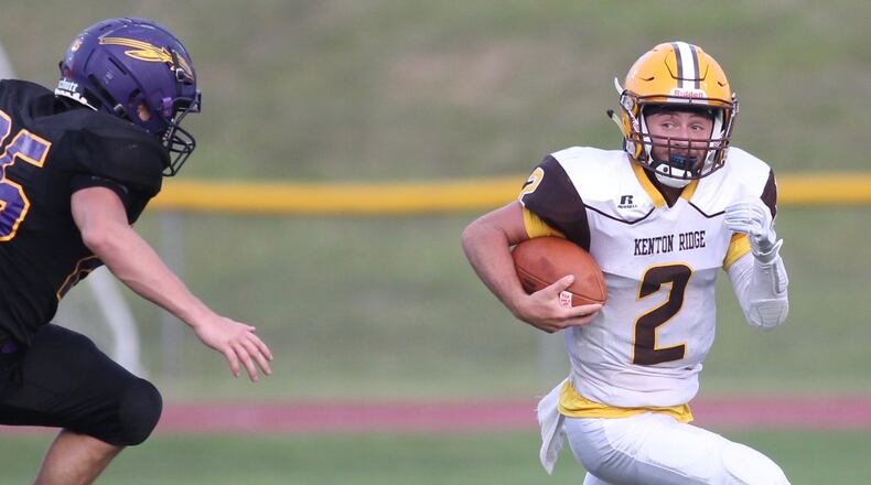 Kenton Ridge's Dylan Lemen runs against Mechanicsburg in the 2019 season opener at Mechanicsburg.