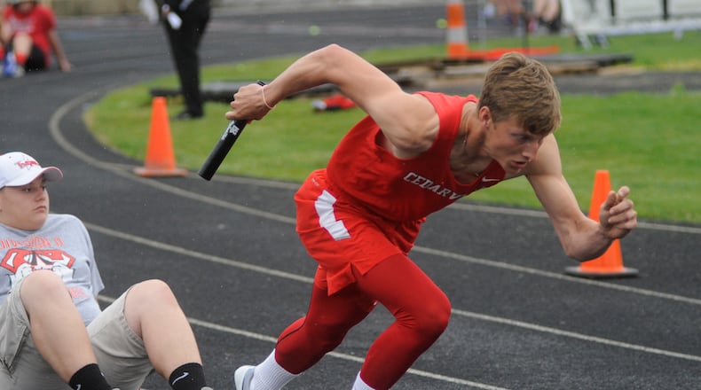 Cedarville’s Devin Gruet starts the 4x200 relay during the D-III regional track and field meet at Troy’s Memorial Stadium on Wednesday, May 24, 2017. MARC PENDLETON / STAFF