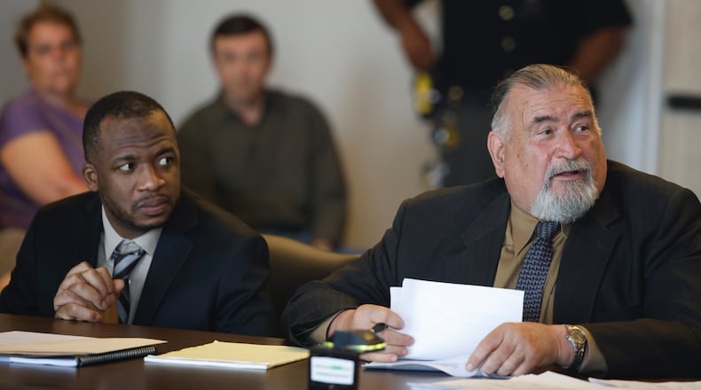 Hermanio Joseph and his attorney, Terry Hart, listens as the prosecution questions prospective jurors during jury selection for Joseph's trial Monday, April 29, 2024. BILL LACKEY/STAFF