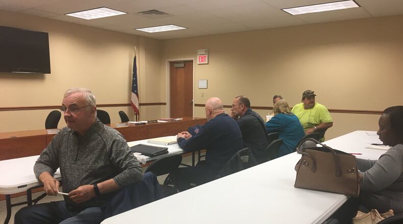 German Twp. officials met Wednesday to determine if Bradley Baugh, a firefighter with the township fire and EMS should keep his job after sharing a Facebook post that contained a racial slur. ALLYSON BROWN/STAFF