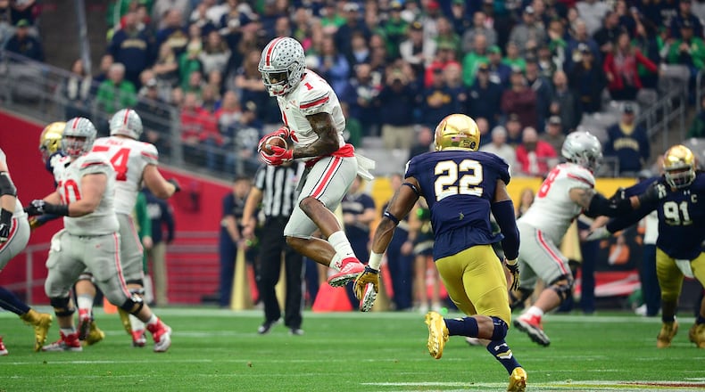 Former Ohio State and Wayne High School star Braxton Miller, seen here catching a pass against Notre Dame in the BattleFrog Fiesta Bowl on January 1, 2016 in Glendale, Arizona, will stage a youth football camp Saturday at his alma mater in Huber Heights. He has also donated several items for a silent auction to raise money for the American Heart Association.