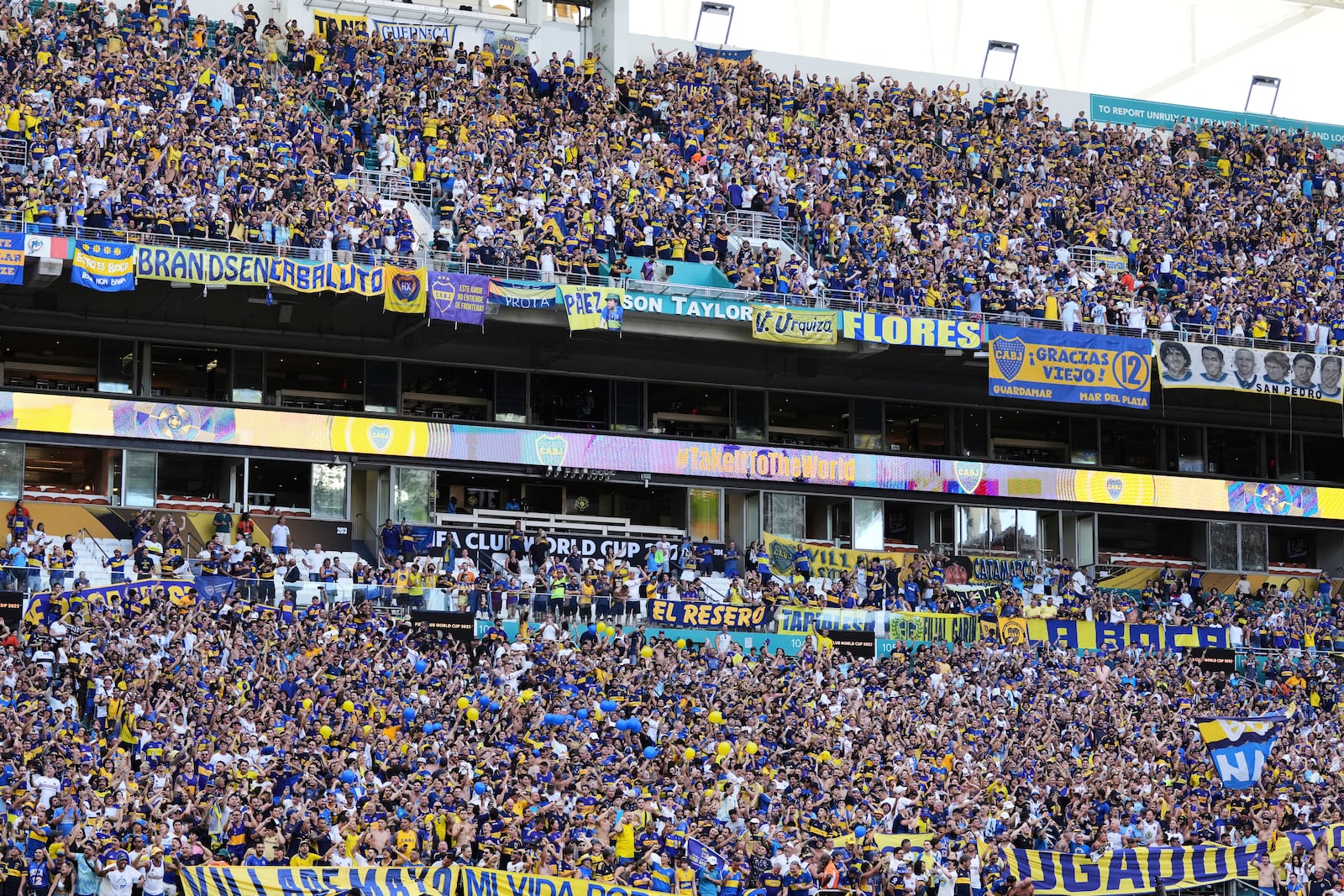 Soccer fans attend the Club World Cup group C soccer match between Boca Juniors and Benfica in Miami Gardens, Fla., Monday, June 16, 2025. (AP Photo/Rebecca Blackwell)