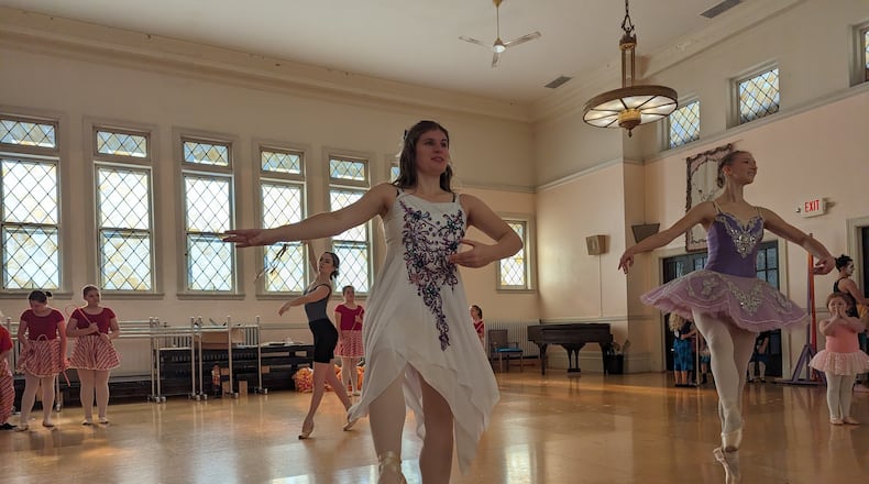 Amelia Clairmont and Heather Hare rehearse for their parts of Clara and the Sugar Plum Fairy as part of the Ohio Performing Arts Institute's 34th annual presentation of "The Nutcracker" on Friday and Saturday, Dec. 1-2, 2023, at the Clark State Performing Arts Center. CONTRIBUTED