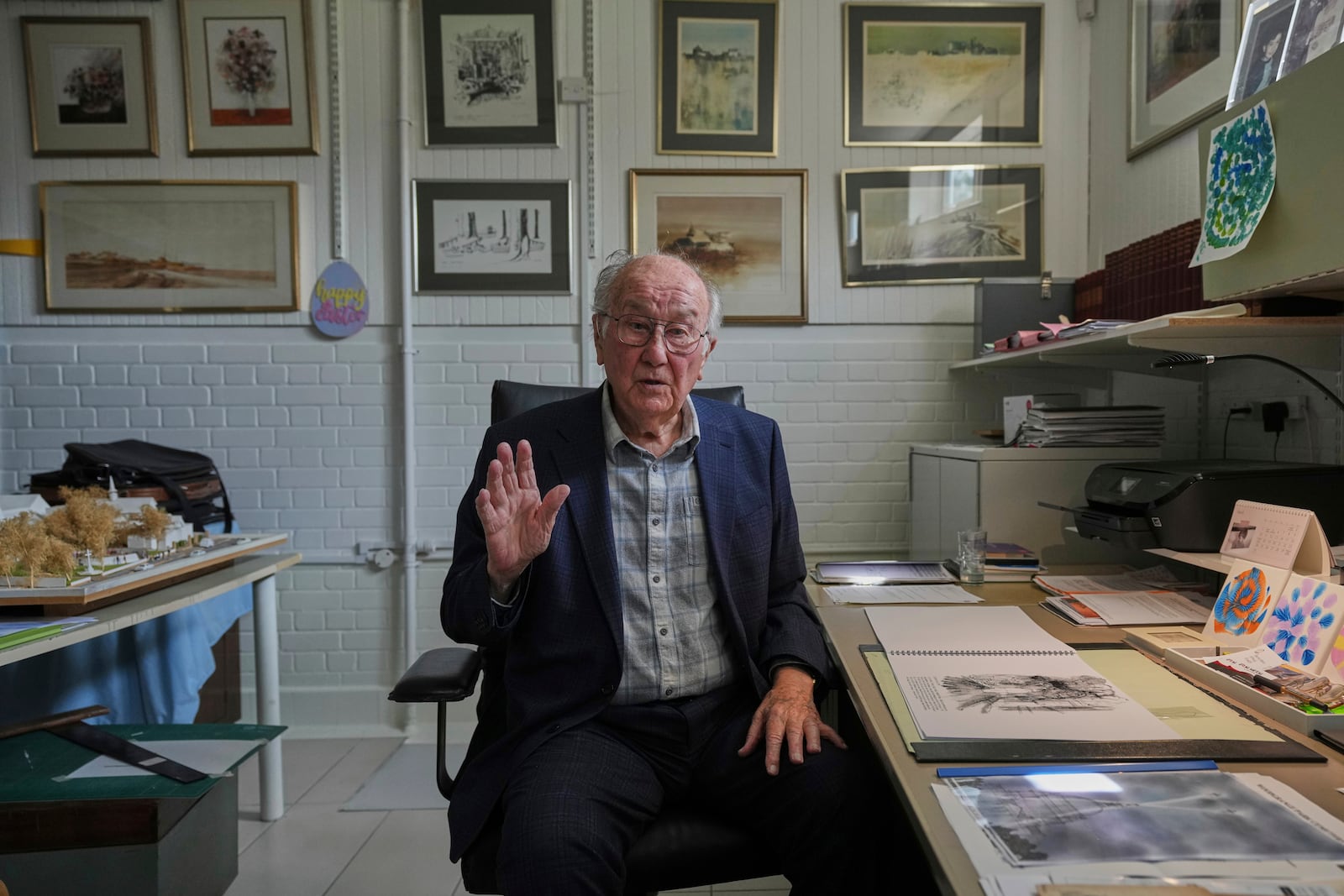John Goldsmith, 94, speaks during an interview at his home in London, Thursday, April 24, 2025. (AP Photo/Kin Cheung)