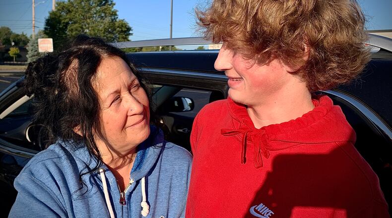 Donna Rue is thankful for Troy High School upperclassmen who helped her son Lucas Hope get away from the school Friday, Sept. 15, 2023 after an announcement of a active shooter at the high school. The announcement was a mistake and there was no shooter. MARSHALL GORBY\STAFF