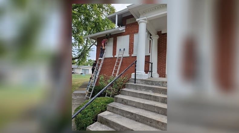Windows and doors on the north side of the Champaign County Historical Society Museum are currently being restored and will be reinstalled by the end of November. Contributed