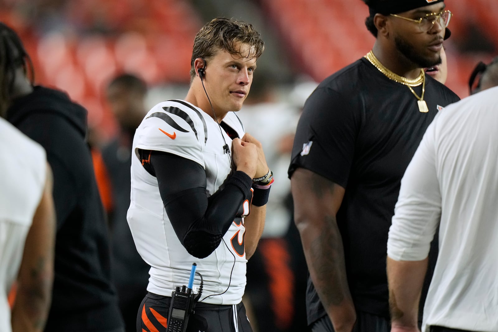 Cincinnati Bengals quarterback Joe Burrow watches from the sidelines during the second half of a preseason NFL football game against the Washington Commanders Monday, Aug. 18, 2025, in Landover, Md. (AP Photo/Stephanie Scarbrough)