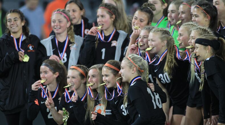 Waynesville poses for a photo after a victory against Ottawa-Glandorf in the Division III state championship game on Friday, Nov. 12, 2021, at Lower.com Field in Columbus. David Jablonski/Staff