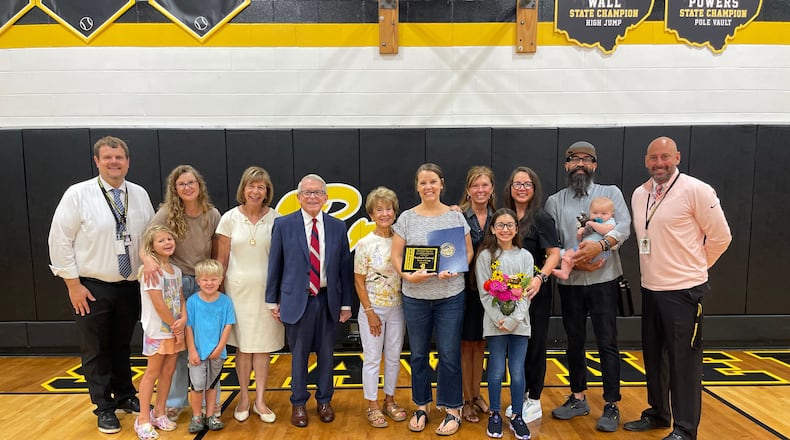 Stephanie Caraway, high school Spanish teacher, who received the Teacher of the Year award during Clark-Shawnee Local School District’s Opening Day celebration with her family, friends and colleagues. Contributed