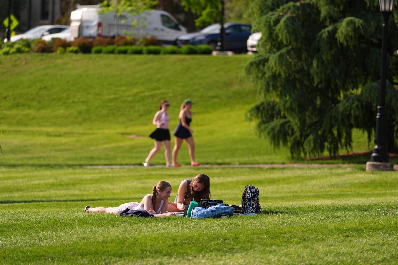 Students enjoy their break at the Villanova University campus, Thursday, May 8, 2025 in Villanova, Pa. (AP Photo/Matt Slocum)