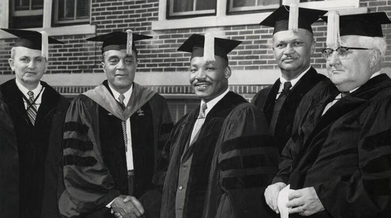 Dr. Martin Luther King, Jr. (center) received an honorary degree from Central State University in 1958. DAYTON DAILY NEWS ARCHIVES