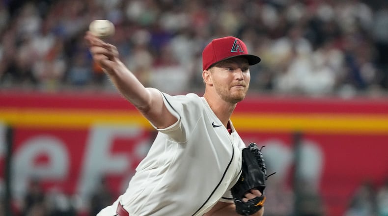 Arizona Diamondbacks pitcher Michael Soroka works against the Detroit Tigers during the first inning of an opening-day baseball game Monday, March 30, 2026, in Phoenix. (AP Photo/Darryl Webb)