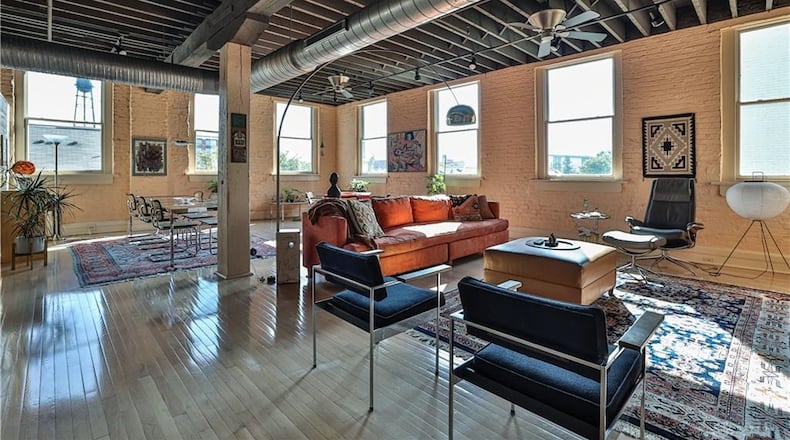 The great room has seven large windows that offer southeast views of the secluded block and downtown. CONTRIBUTED
