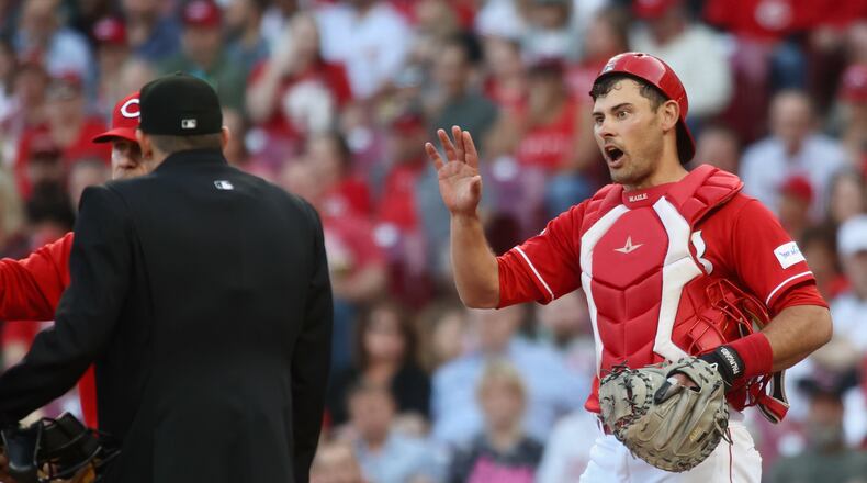 Reds catcher Luke Maile argues a call during a game against the White Sox on Friday, May 5, 2023, at Great American Ball Park in Cincinnati. David Jablonski/Staff