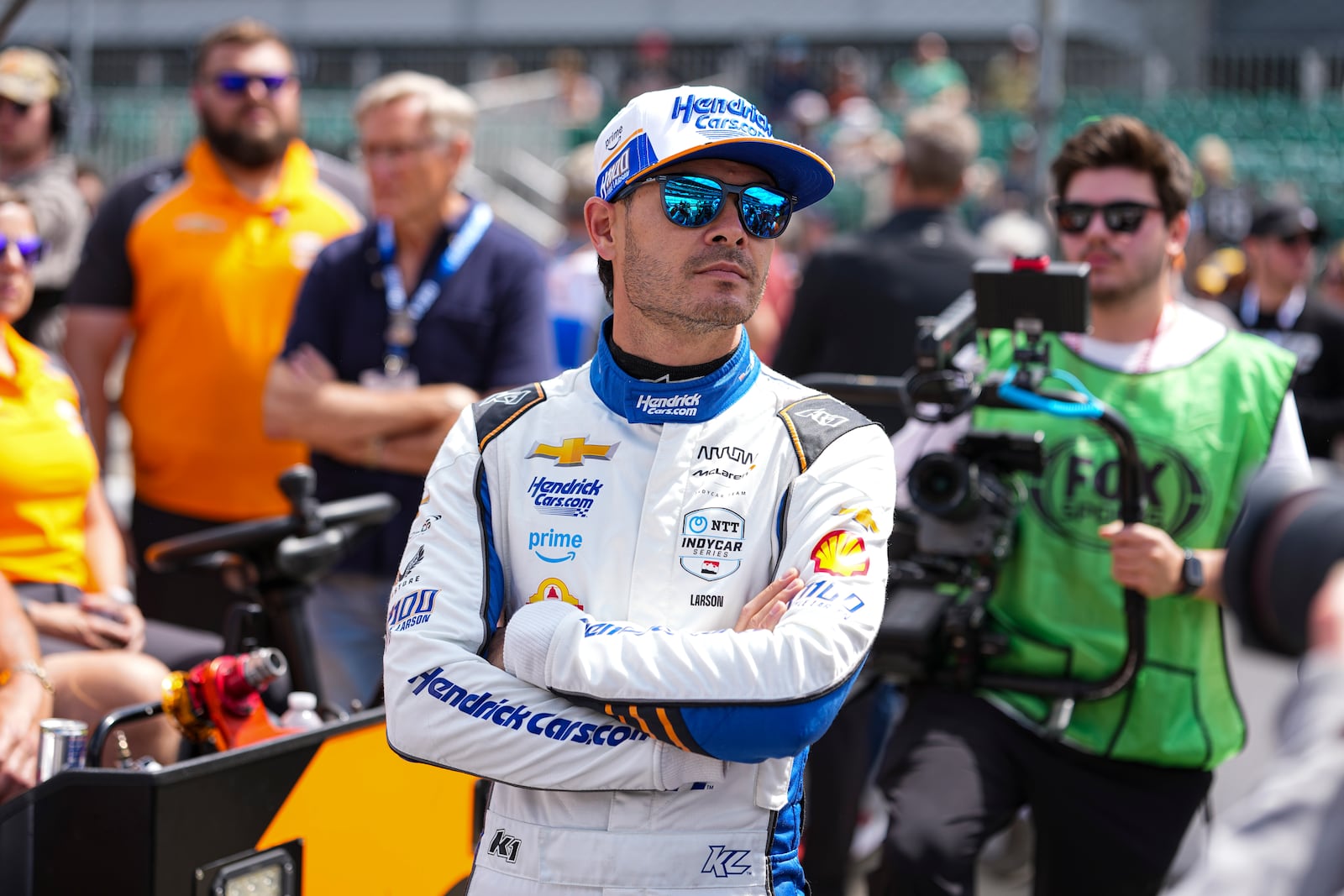Kyle Larson watches as he waits for is turn during qualification for the Indianapolis 500 auto race at Indianapolis Motor Speedway in Indianapolis, Saturday, May 17, 2025. (AP Photo/Michael Conroy)
