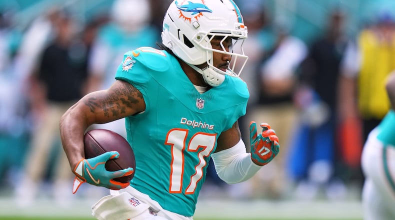FILE - Miami Dolphins wide receiver Jaylen Waddle (17) runs during the first half of an NFL football game against the Tampa Bay Buccaneers, Dec. 28, 2025, in Miami Gardens, Fla. (AP Photo/Lynne Sladky, File)