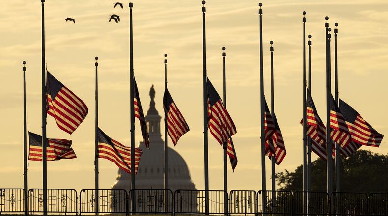 American flags are flown at half-staff in response to the San Jose mass shooting. Kevin Dietsch/Getty Images