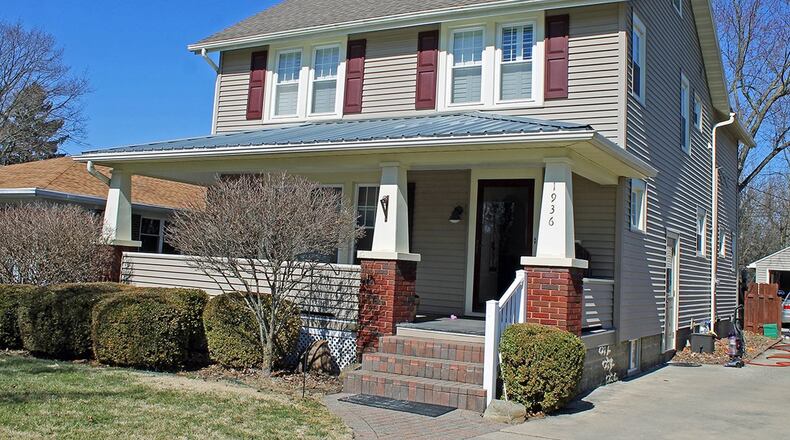 Built in 1928, this 4-bedroom home offers many original features. There is a detached garage and covered porch. CONTRIBUTED PHOTO BY VICKIE KAPNAS